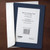 Navy blue photo insert card with white envelope