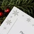 Details of silver foil stamped snowflake design