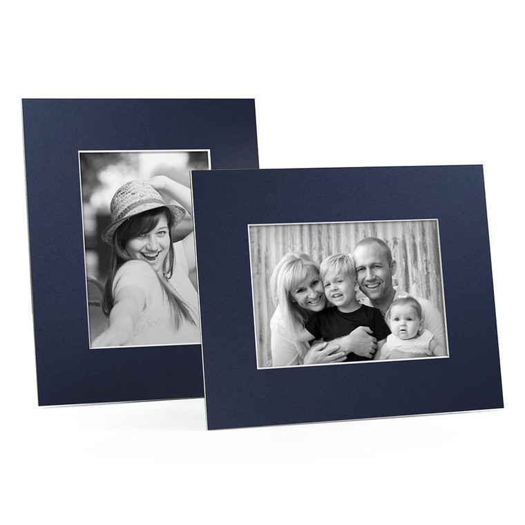 Blank navy blue cardboard frames in horizontal and vertical format