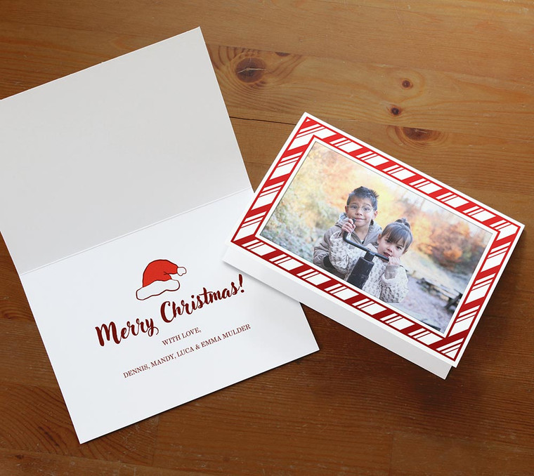 Candy cane themed Christmas card with printed holiday sentiment inside the card