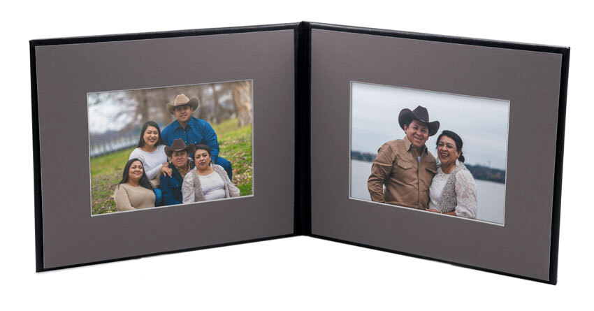 Black photo folio for two 5x7 photos framed in gray mat board.