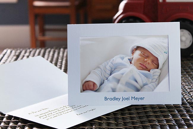 Light blue birth announcement photo frame card