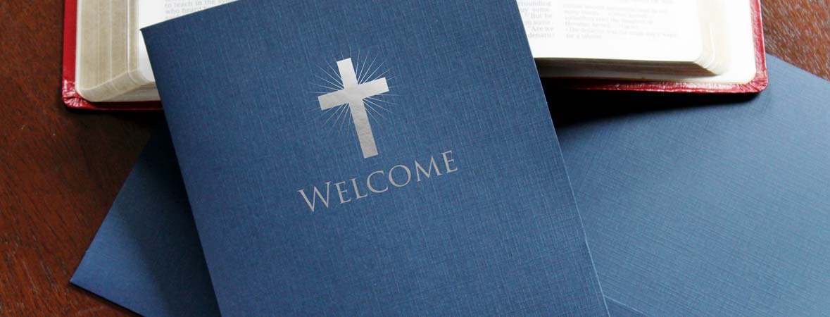 Recycled blue linen church welcome folder with silver foil cross design