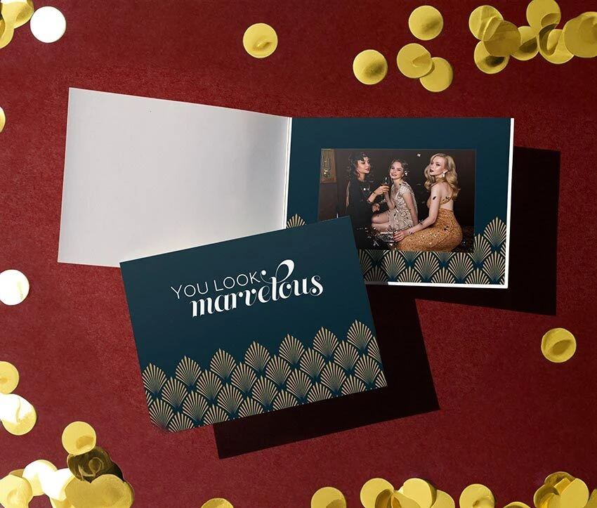Art deco-inspired photo folder with a navy blue and gold design
