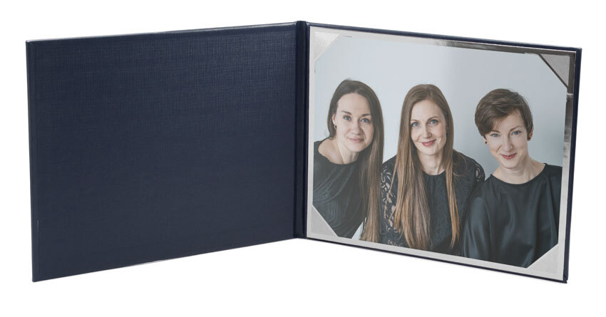 Navy blue photo folio open, holding one 8x10 photo