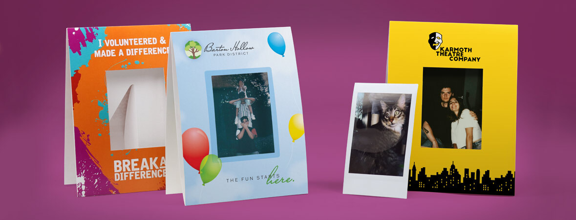 A group of custom printed Instax Mini paper frames with themed designs and logos.