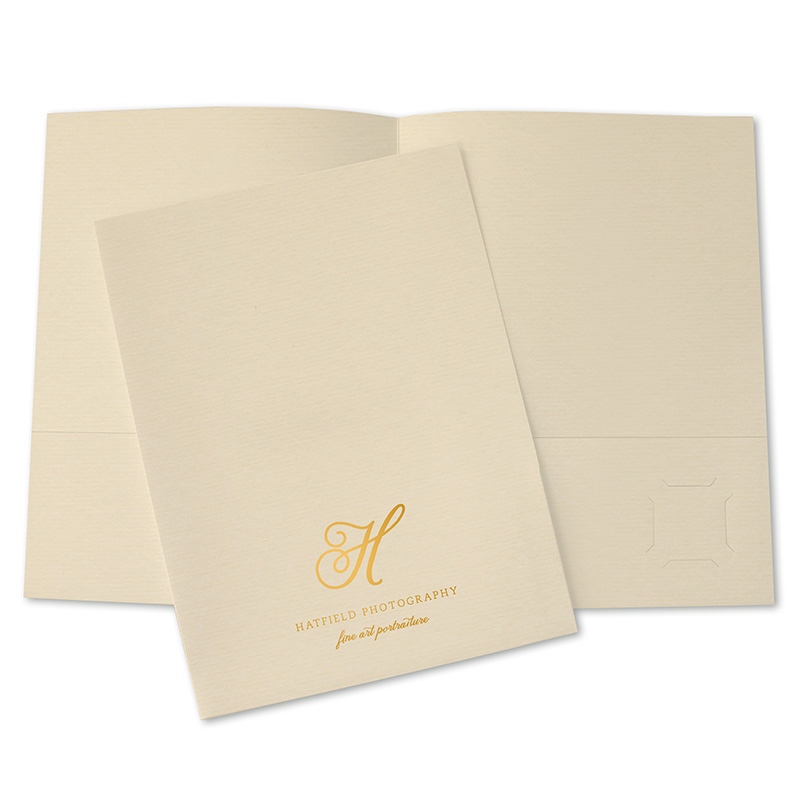 Recycled presentation folder with copper foil stamped photo studio logo