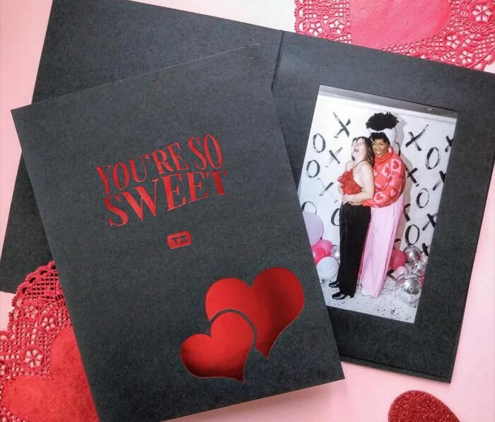 Black photo folder with red foil imprint