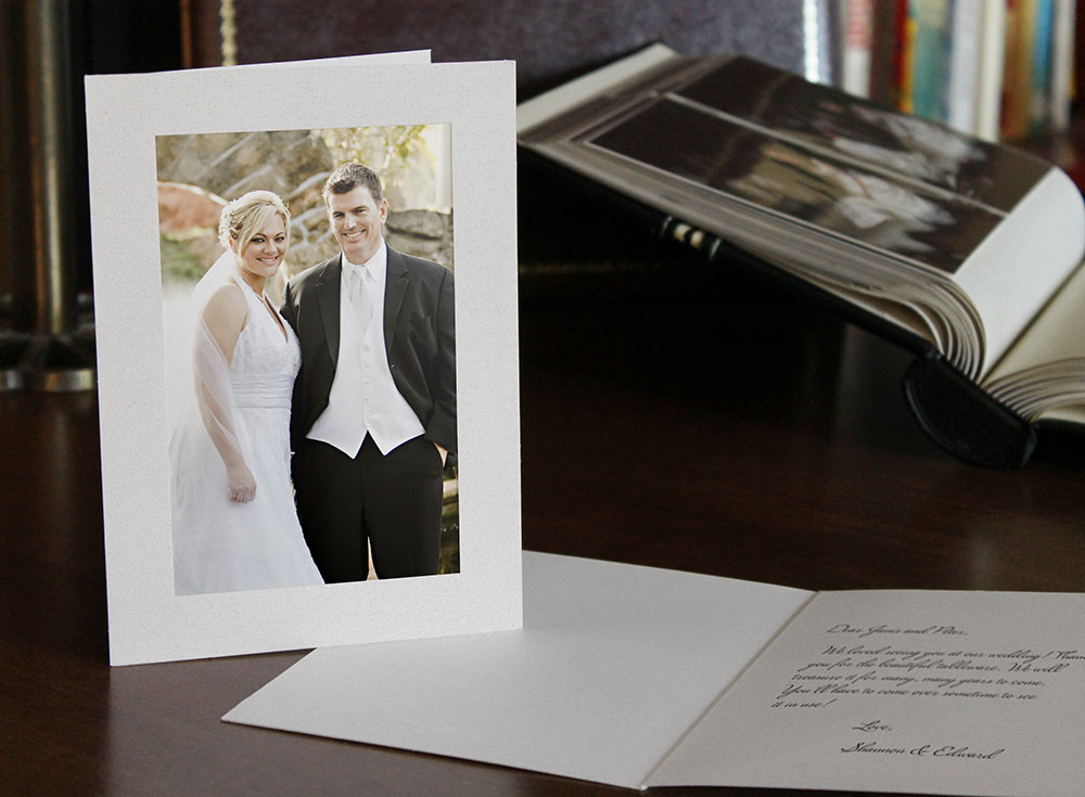 White photo insert wedding thank you card with handwritten message