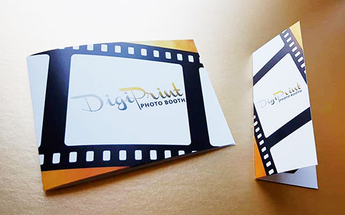 Vintage-themed photo folder with film strip design and photo booth company logo