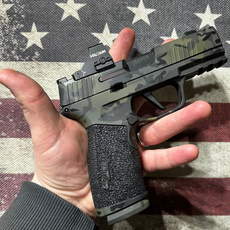 Complete Sig P365 XMacro build with camo cerakote and stippling done by IDG Stippling