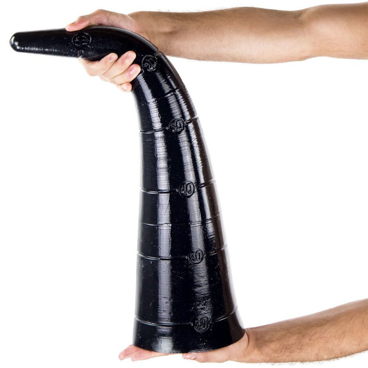 Man bending the huge black cone shaped dildo