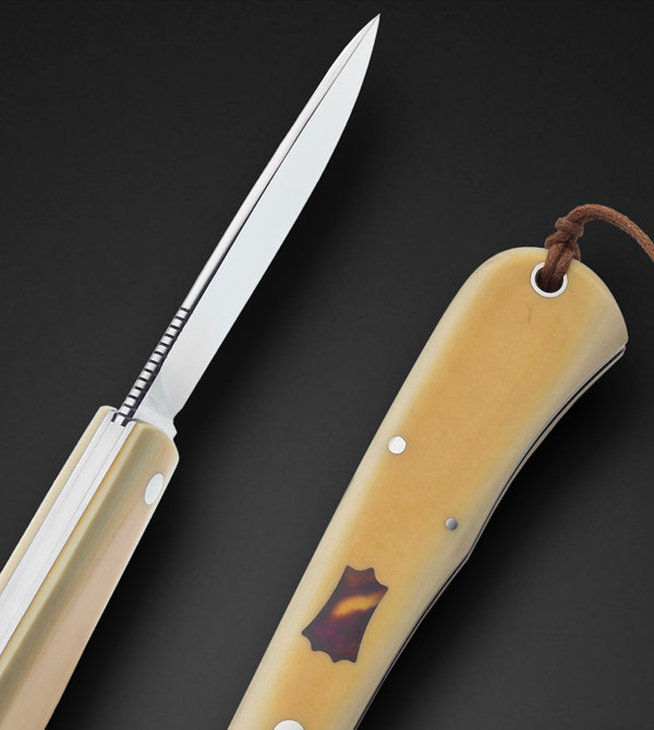 80%, F1 Shadow Folder with Westinghouse Ivorite Scales and Antique Amber Shield by Tom Ploppert