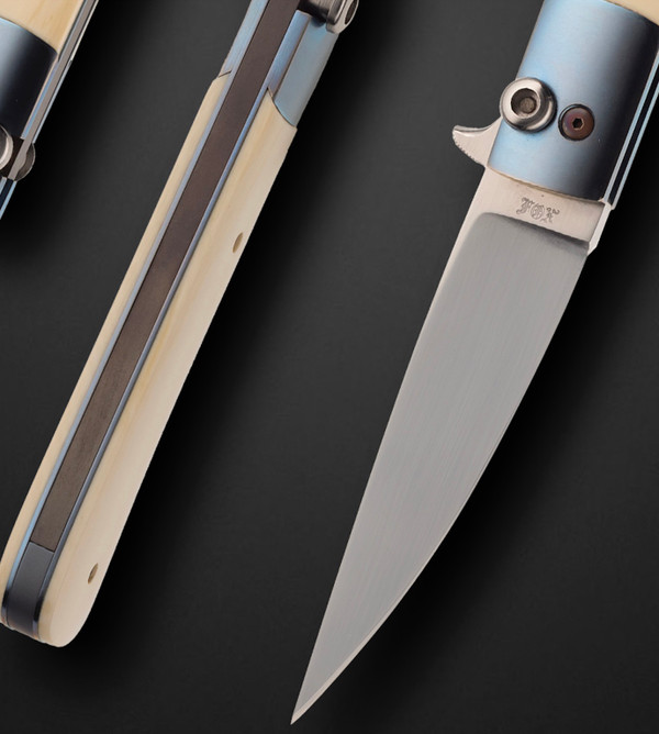 Desert Fox Model, Custom Toggle Lock Folding Knife with Anodized Titanium and Fossilized Mammoth Scales by Paul Fox Desert Fox Model, Custom Toggle Lock Folding Knife with Anodized Titanium and Fossilized Mammoth Scales by Paul Fox