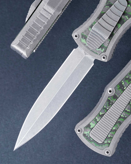 Deadlock, Model "C" M390 Double Edge Blade, Tumbled Titanium Chassis with Cross Cut Jungle Wear Fat Carbon Inlays, by Gavin Hawk of Hawk Knives Designs Deadlock, Model "C" M390 Double Edge Blade, Tumbled Titanium Chassis with Cross Cut Jungle Wear Fat Carbon Inlays, by Gavin Hawk of Hawk Knives Designs