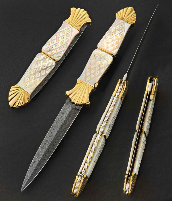 Large, Automatic, White Pearl Folding Dagger with 18K Bolsters & Pins by Ken Steigerwalt, with Jerry Rados Turkish Damascus Blade Large, Automatic, White Pearl Folding Dagger with 18K Bolsters & Pins by Ken Steigerwalt, with Jerry Rados Turkish Damascus Blade
