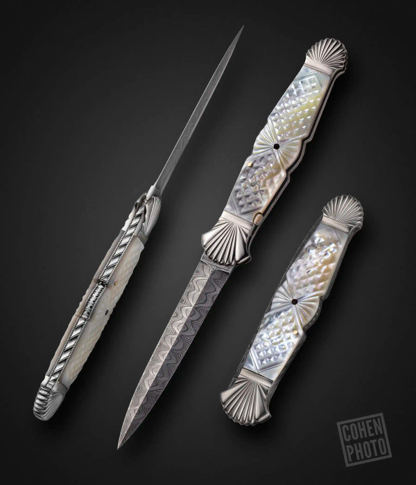 Button Release Automatic Damascus Dagger in Pearl, by Ken Steigerwalt Button Release Automatic Damascus Dagger in Pearl, by Ken Steigerwalt