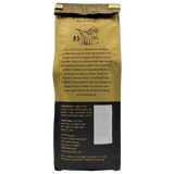 Back view of one eight ounce bag of Royal Kona Vanilla macadamia ten percent kona coffee, ground. Brown and gold bag