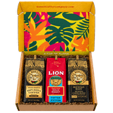 Open Hawaii Coffee Company gift box lined with tropical floral pattern, holding three coffee bags: Royal Kona Private Reserve, Lion Gold Roast, and Royal Kona Mountain Roast