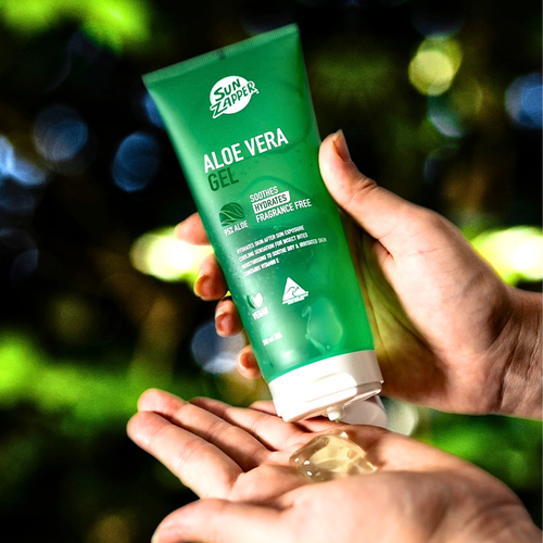 Images show the product Sun Zapper Aloe Vera with Vitamin E and Panethanol being squeezed out of the package