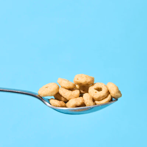 Low Carb Emporium Protein Cereal Cinnamon Flavour 250g content in a spoon