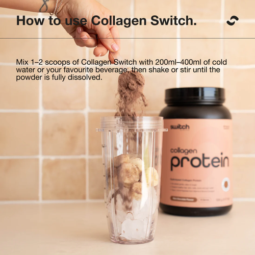 A hand adds chocolate powder to a blender cup with ice and banana slices. A container of Collagen Switch protein powder is visible in the background.