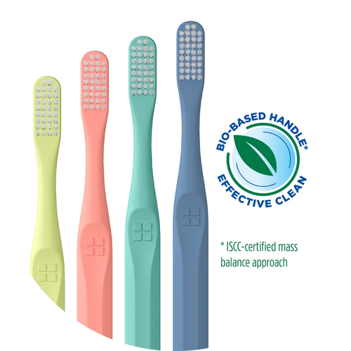 Four GUM Classic 409 Soft Toothbrushes in lime, coral, teal, and blue colors, featuring the "Bio-Based Handle" logo.