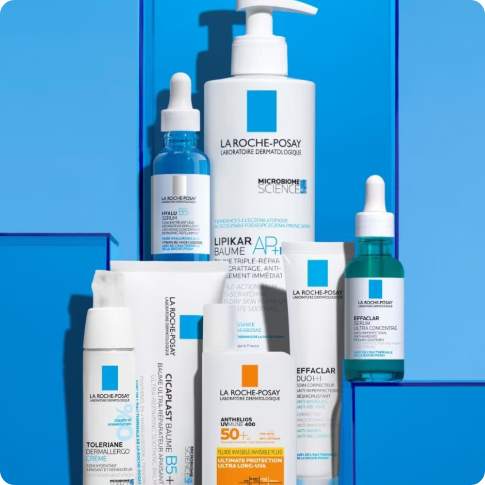 The La Roche Posay range of products in front of a blue wall