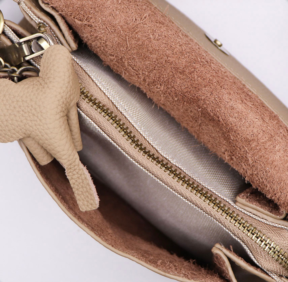 Suede leather bag in taupe brown. Crossbody or shoulder bag in