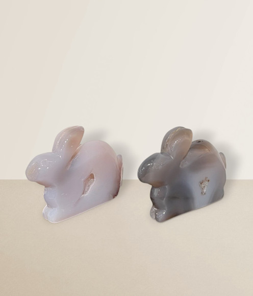 Agate Rabbit Carvings, two samples, front-facing, against a light cream coloured background.