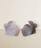 Agate Rabbit Carvings, two samples, back-facing, against a light cream coloured background.