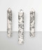 Howlite - a variety of points in extra-large sizes, against a light grey background.