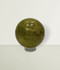 Green Opal Orb - solo piece #1, from the back, against a light lime coloured background.