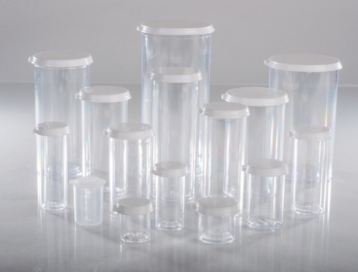 Lineup of clear plastic snap cap vials in sizes from 1 dram to 50 dram