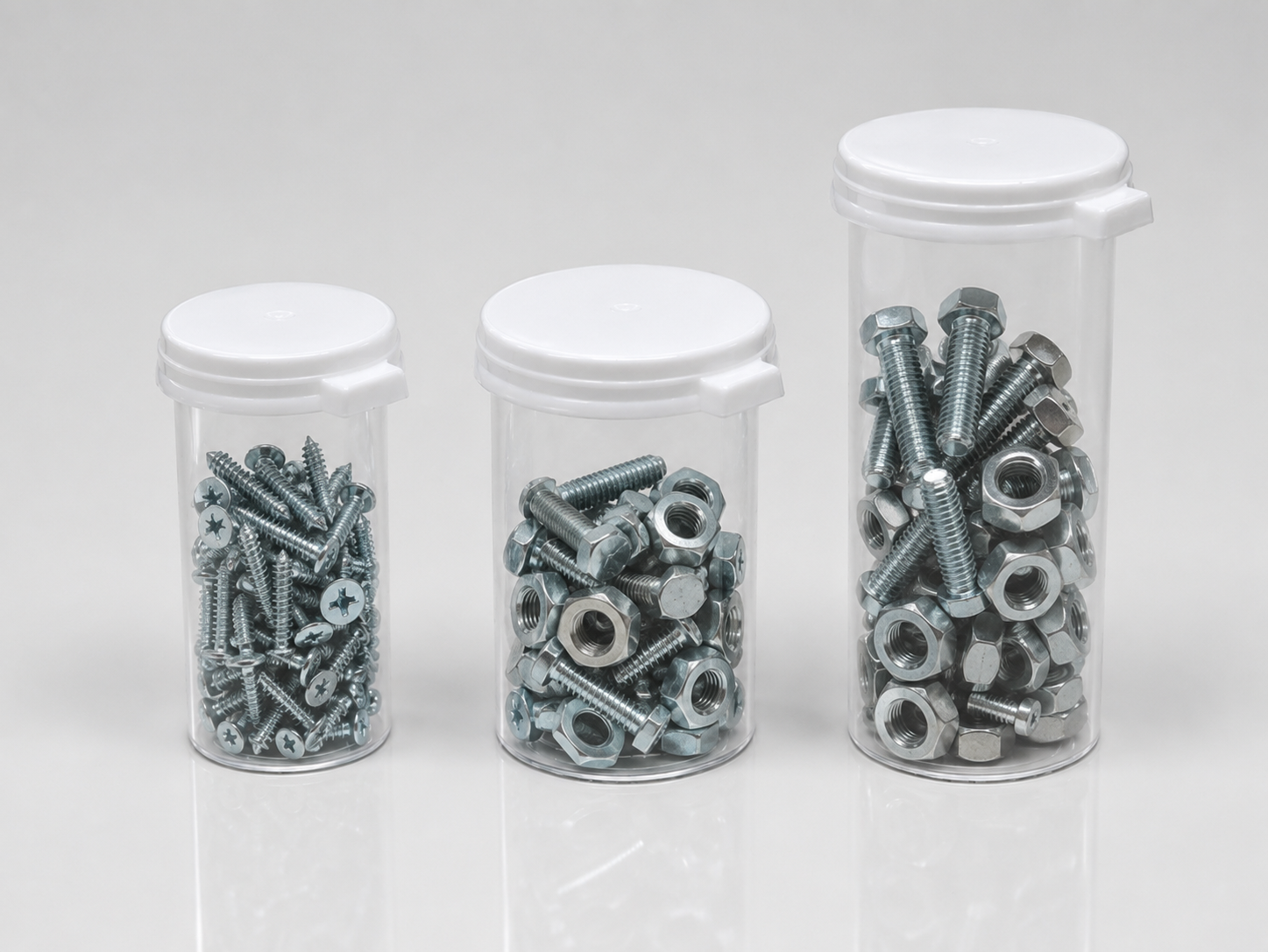 Nuts and bolts packaged in clear plastic vials