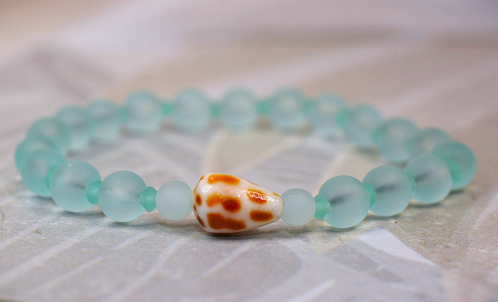 blue bead bracelet with charm
Turquoise bracelet
cone shell bracelet
Buy hebrew cone shell bracelet
Buy aqua shell bracelet at Bottled Ocean Treasures
aqua bracelet with cone shell
Shell bracelet with starfish