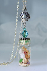 Bottle shells 
clam shell necklace
tiny seashells
tiny seashells bottle