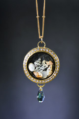 gold locket necklace with seashells