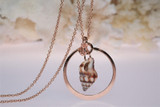 Rose gold necklace with spindle shell 