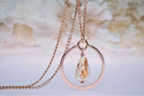 Rose gold necklace with cone shell 