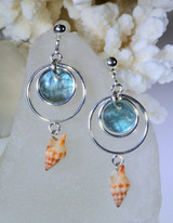 Round silver earrings with shells