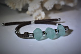 green glass bracelet original 
green sea glass suede
suede glass bracelet Hawaii original