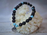 Lava bead clamshell bracelet
Black lava beads
Turquoise bracelet
Lava and turquoise bracelet
Clamshell charm bracelet 