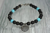 Black lava and turquoise bracelet
Clamshell bracelet
Charm bracelet turquoise
Lava charm bracelet
Turquoise clamshell charm bracelet
Bracelets from Hawaii
Bottled Ocean Treasures