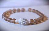 Miter shell bracelet Hawaii
Hawaii's miter shells
Brown and white shell bracelet
Brown frosted bead bracelet
Best bracelets from Hawaii
Frosted bead bracelet
Brown glass bracelet
One of a Kind bracelets from Hawaii