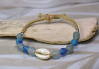 blue bead bracelet with charm
Turquoise bracelet
Buy cowrie shell bracelet
Hawaii seashells
White cowrie shell bracelet
suede shell bracelet
glass bead bracelet wit suede
where to buy suede bracelet with Hawaii shells
blue suede bracelet at Bottled Ocean Treasures
blue suede with white shell bracelet 
puka shells
