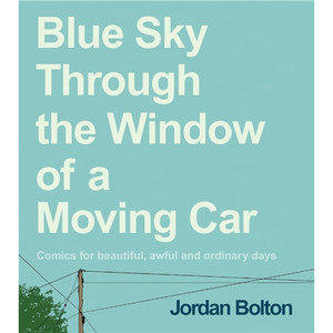 BLUE SKY THROUGH THE WINDOW OF A MOVING CAR HC