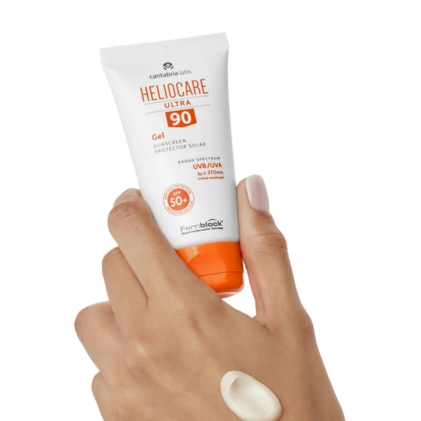 Heliocare Ultra Gel SPF 90 Being Held in Hand with Texture