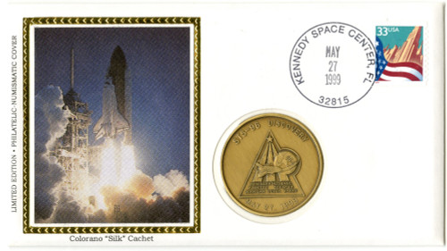 STS96M  - STS-96. Launch cover with official medal