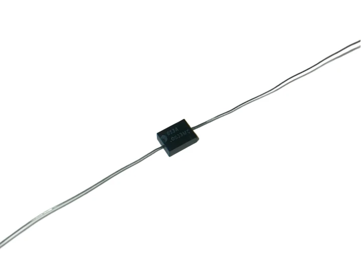 653A1C332M Flame Retardant, Epoxy Case, Rectangular Axial Leads, .0033MFD 26AWG 200V 20%, Bulk, RoHS